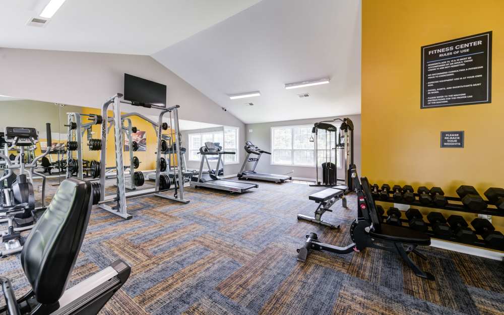 Well-equipped fitness center with cardio equipment at Chason Ridge Apartment Homes in Fayetteville, North Carolina