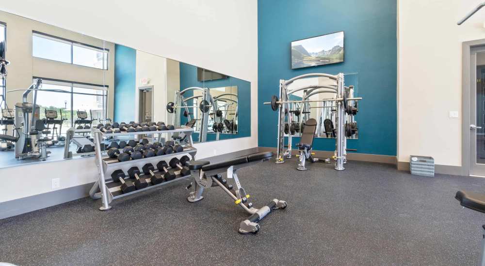 Fitness center at Millennium Place in Corinth, Texas
