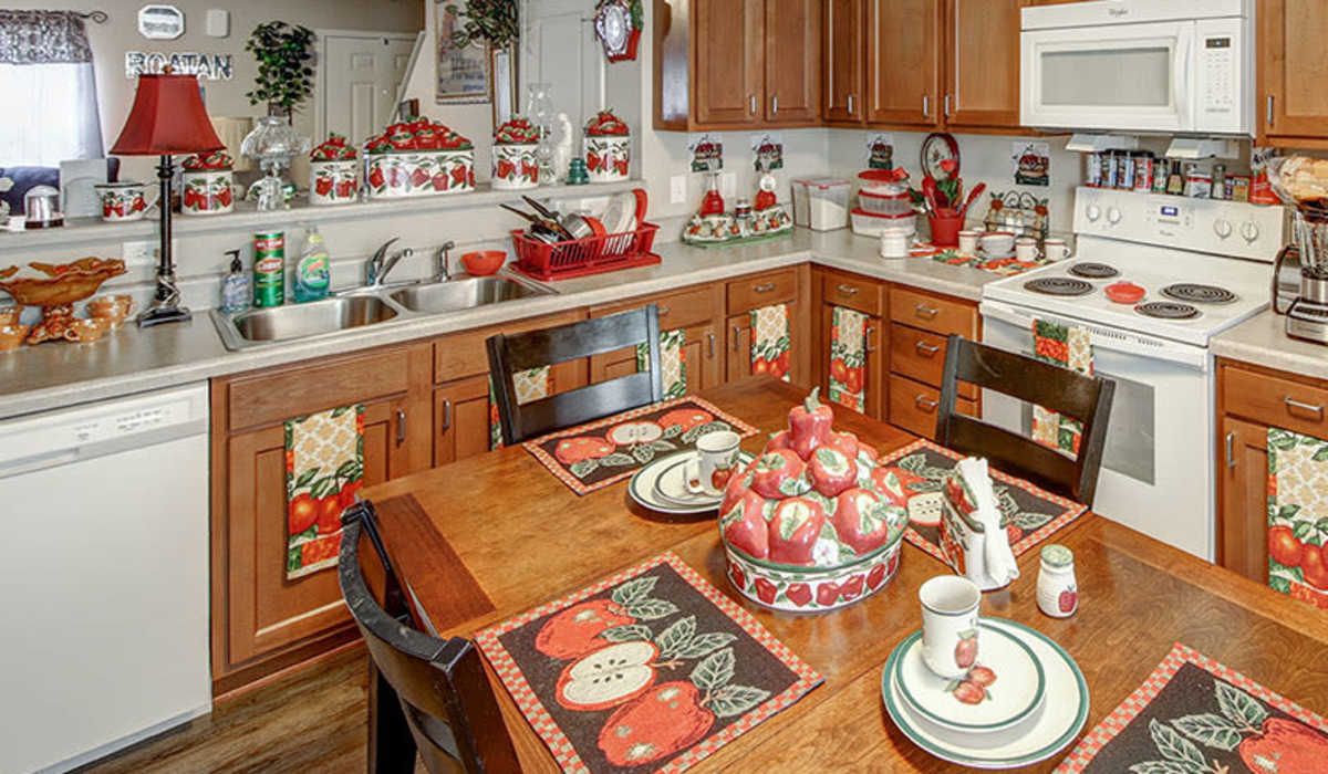 Kitchen with white appliances including dishwasher at Butler Crossing I in Kingstree, South Carolina
