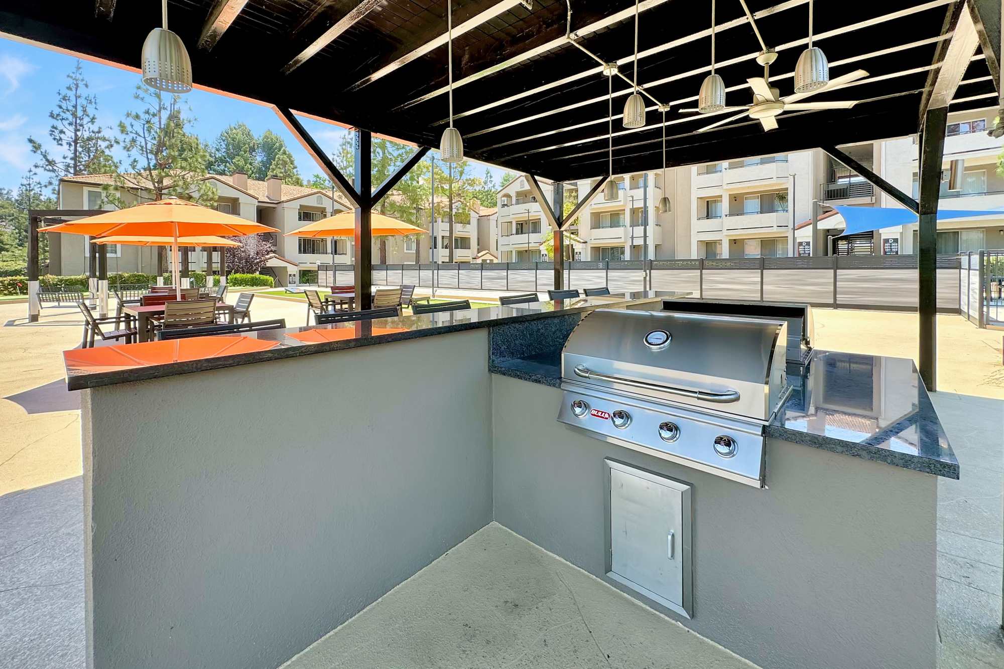 Outdoor patio area at Sierra Del Oro Apartments in Corona, California