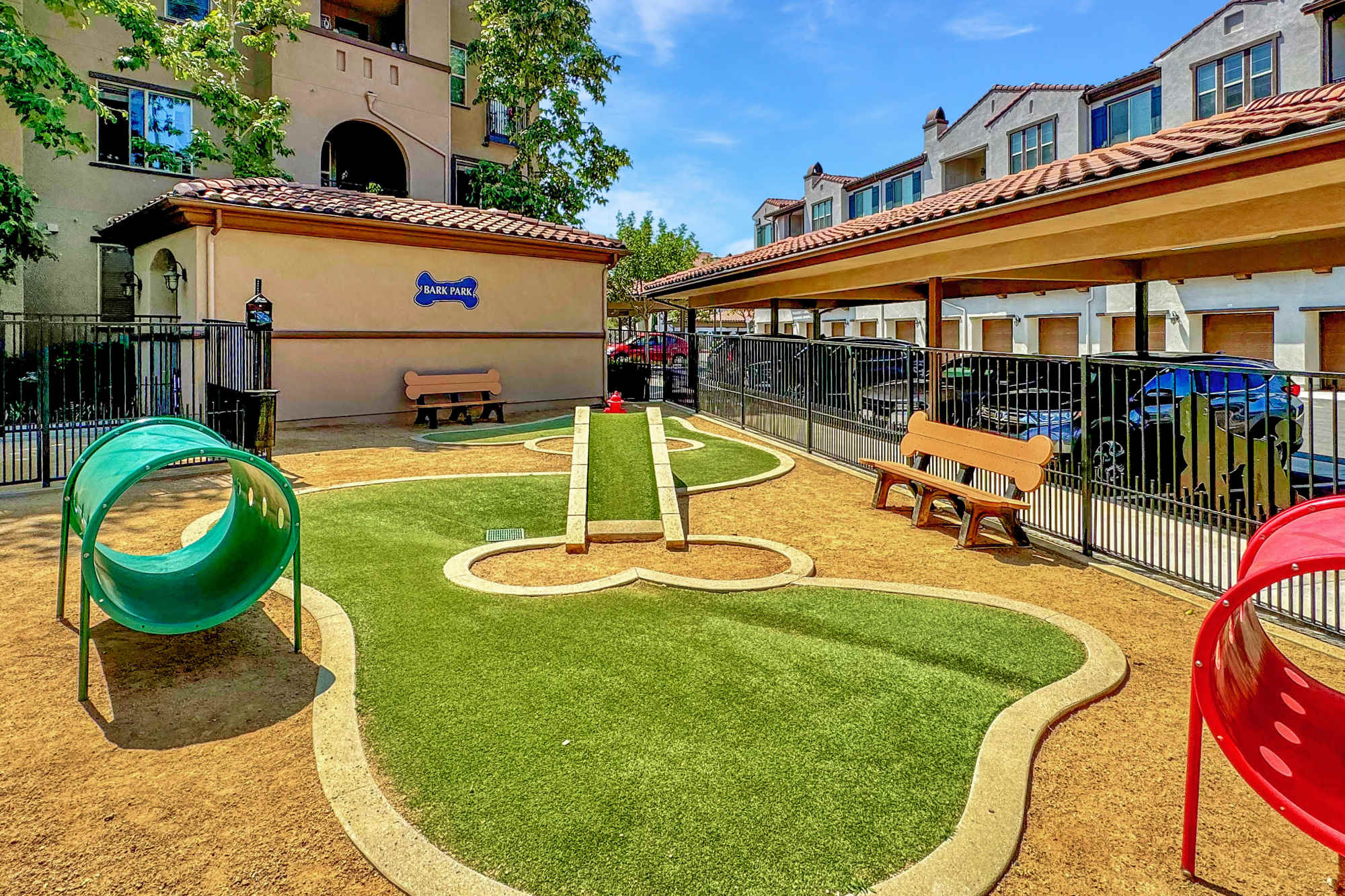 Dog park with slides at Palisades Sierra Del Oro in Corona, California