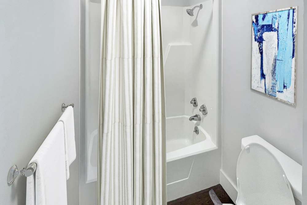Bathroom with tub and shower at Pike Place in Pittsburgh,Pennsylvania