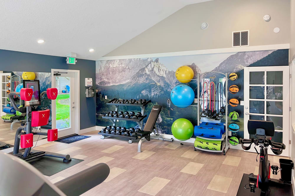 Fitness center with plenty of individual workout stations at Carriage Park Apartments in Vancouver, Washington