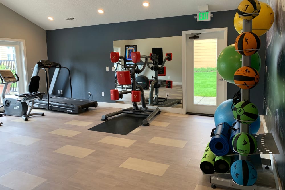 Fitness center with plenty of individual workout stations at Carriage Park Apartments in Vancouver, Washington