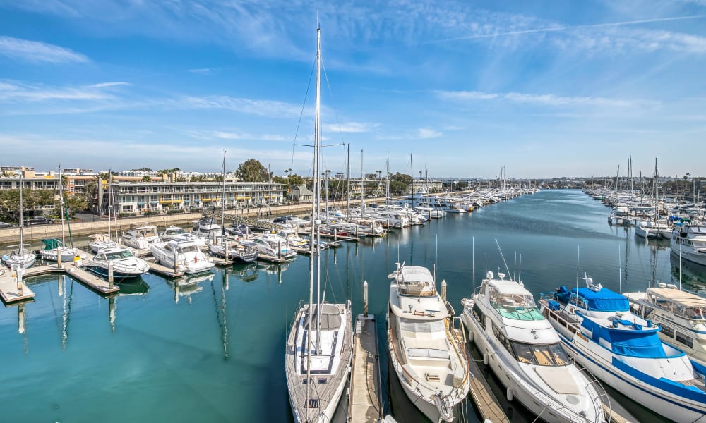 Aerial view of luxury yachts in slips at the marina at Marina Harbor in Marina del Rey, California