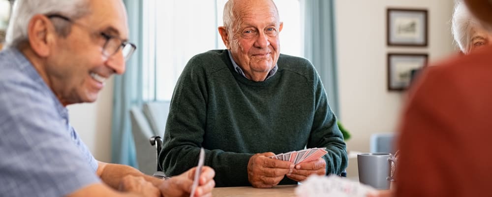 Residents playing cards at Vista Prairie Communities in Champlin, Minnesota