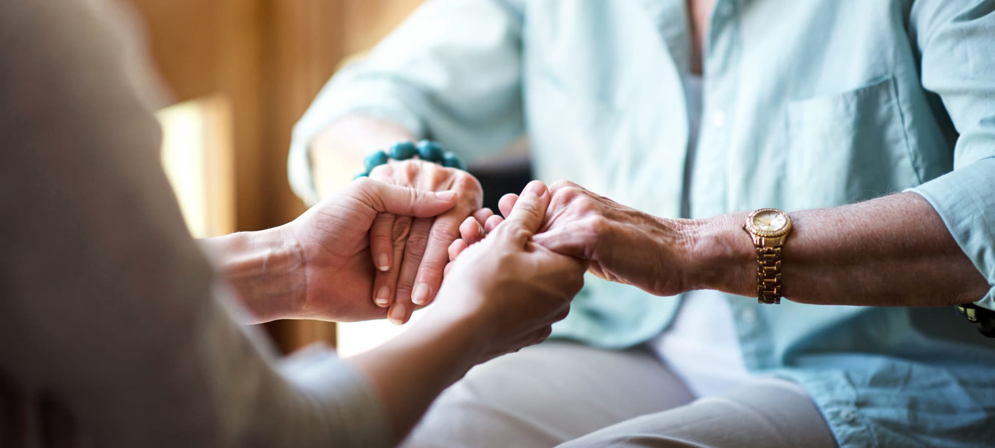 Staff member taking care of resident at Grand Villa of Ormond Beach in Ormond Beach, Florida