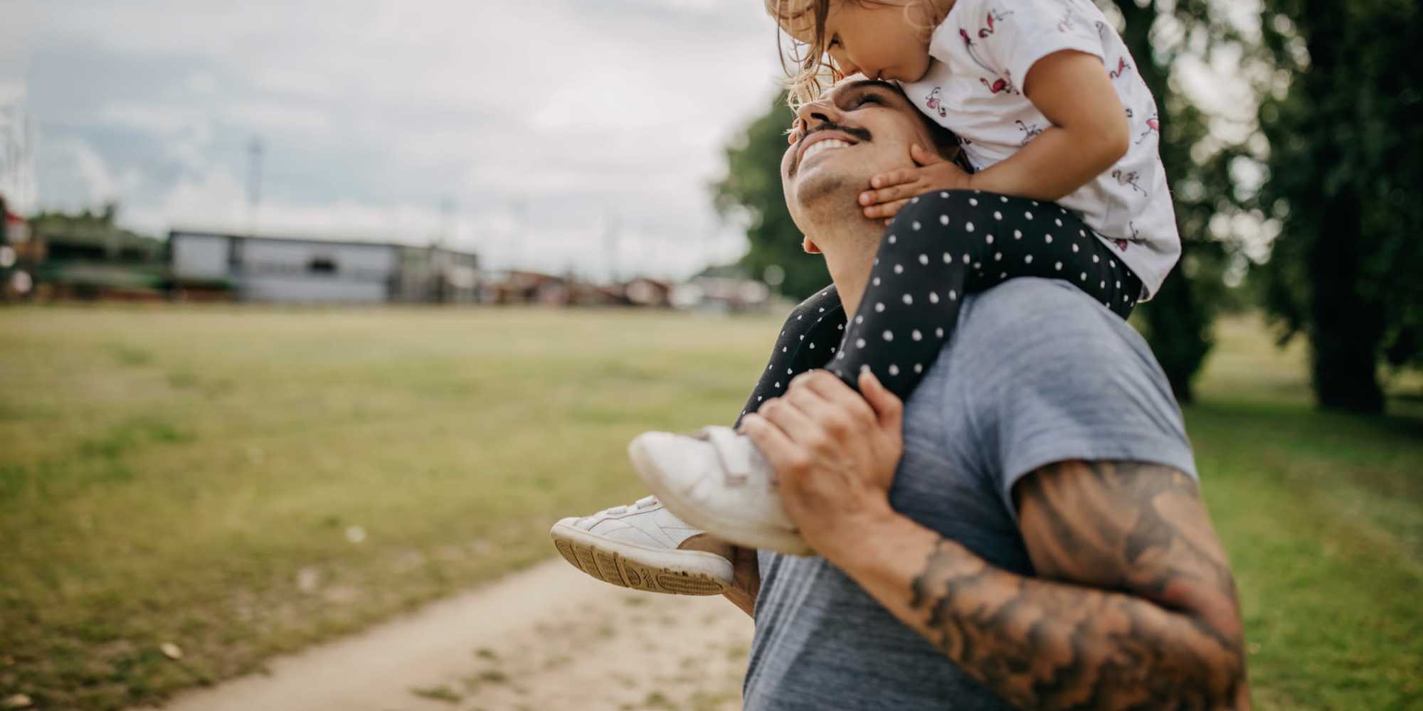 Happy father playing with his kid at Hart Townes in Woodruff, 