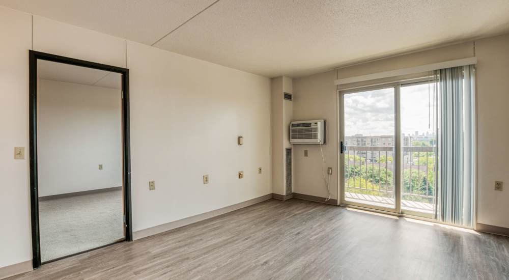 Spacious model living space at Village Center in Detroit, Michigan