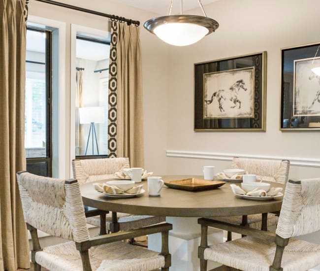 Dining table in model luxurious apartment home at The Overlook Sandy Springs in Atlanta, Georgia