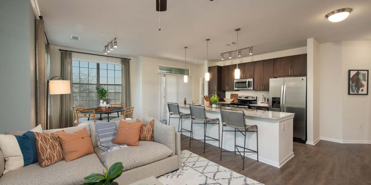 Living room and kitchen at Nantucket At Fannin Station in Houston, Texas 