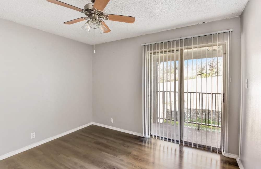 Apartment with sliding glass door at The Lodge at Timberhill, San Antonio, Texas