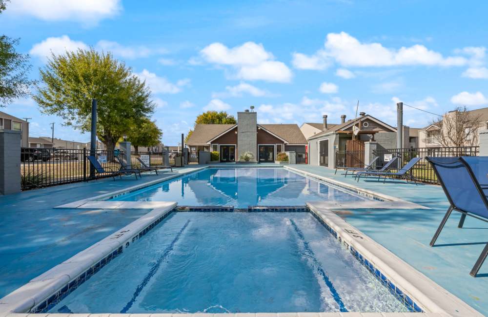 Resort-style swimming pool at Derby Park Apartments in Round Rock, Texas