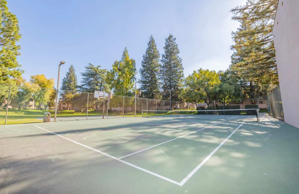 Tennis court at Riverview Gardens Apartments in Fresno, California