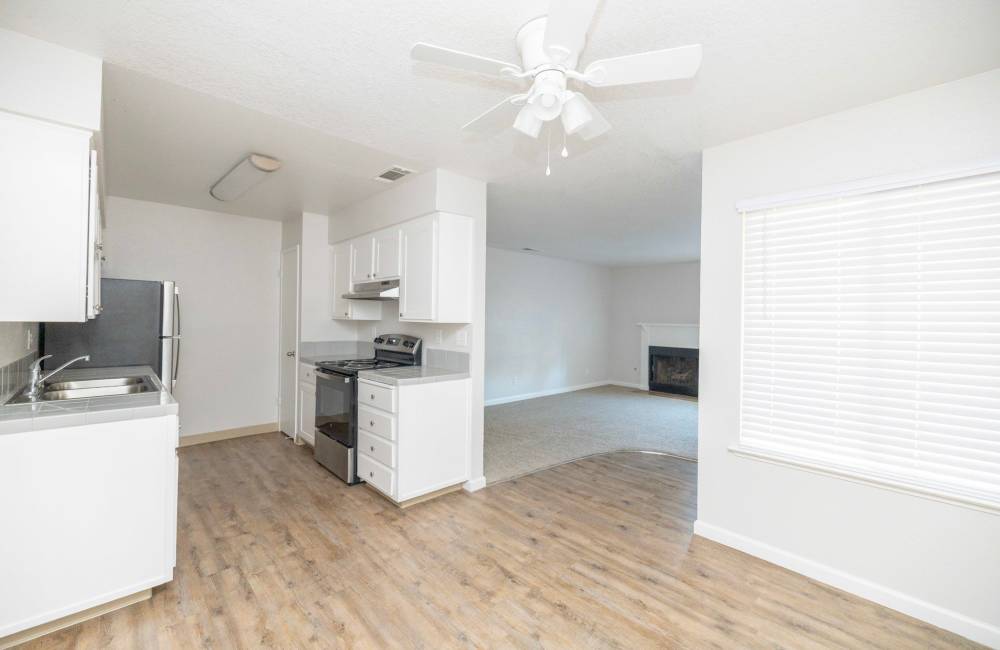 View of kitchen from living room at Riverview Gardens Apartments in Fresno, California