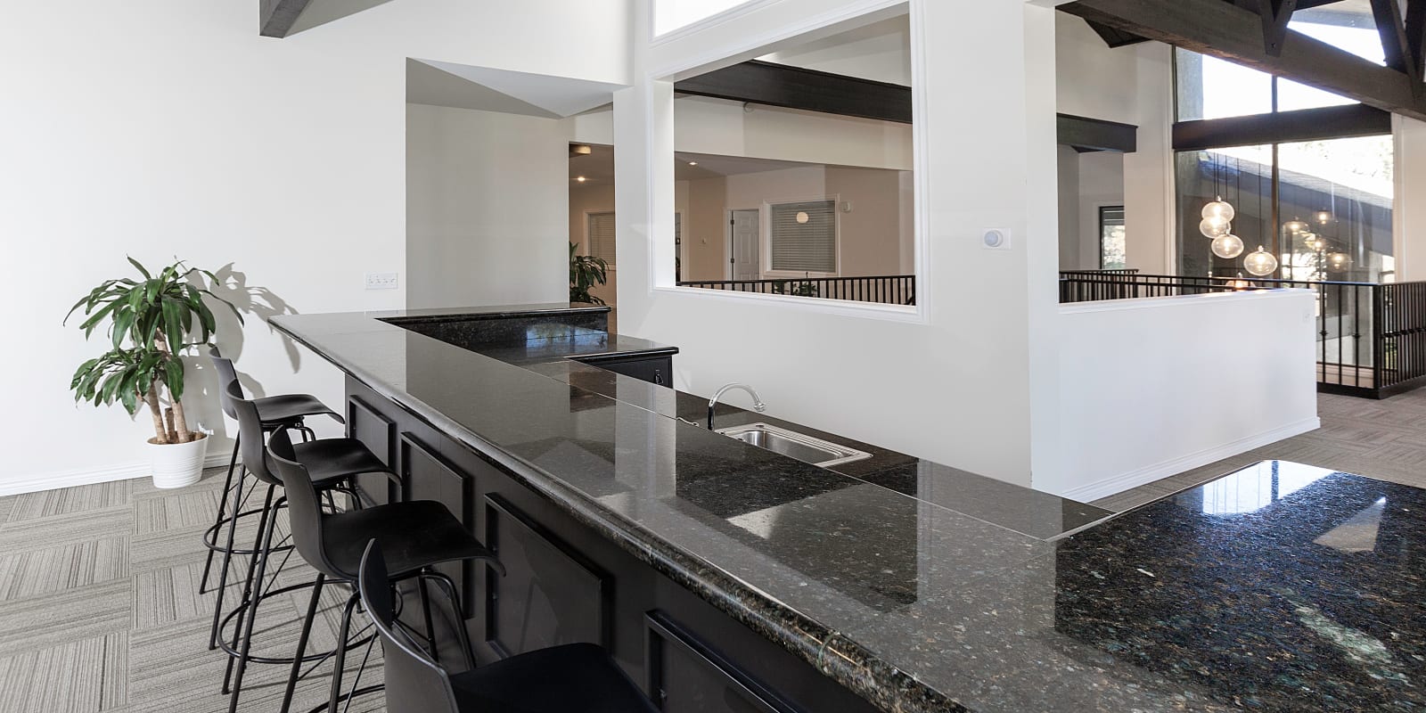 Clubhouse countertop seating at Springs of Country Woods Apartments in Midvale, Utah