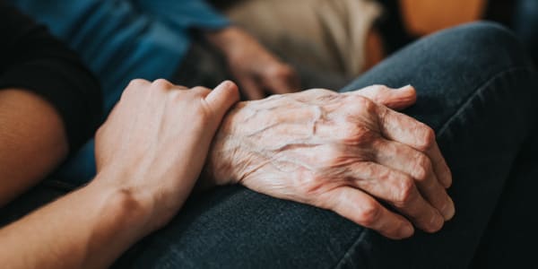 Caretaker comforting a resident at Ingleside Communities in Mount Horeb, Wisconsin