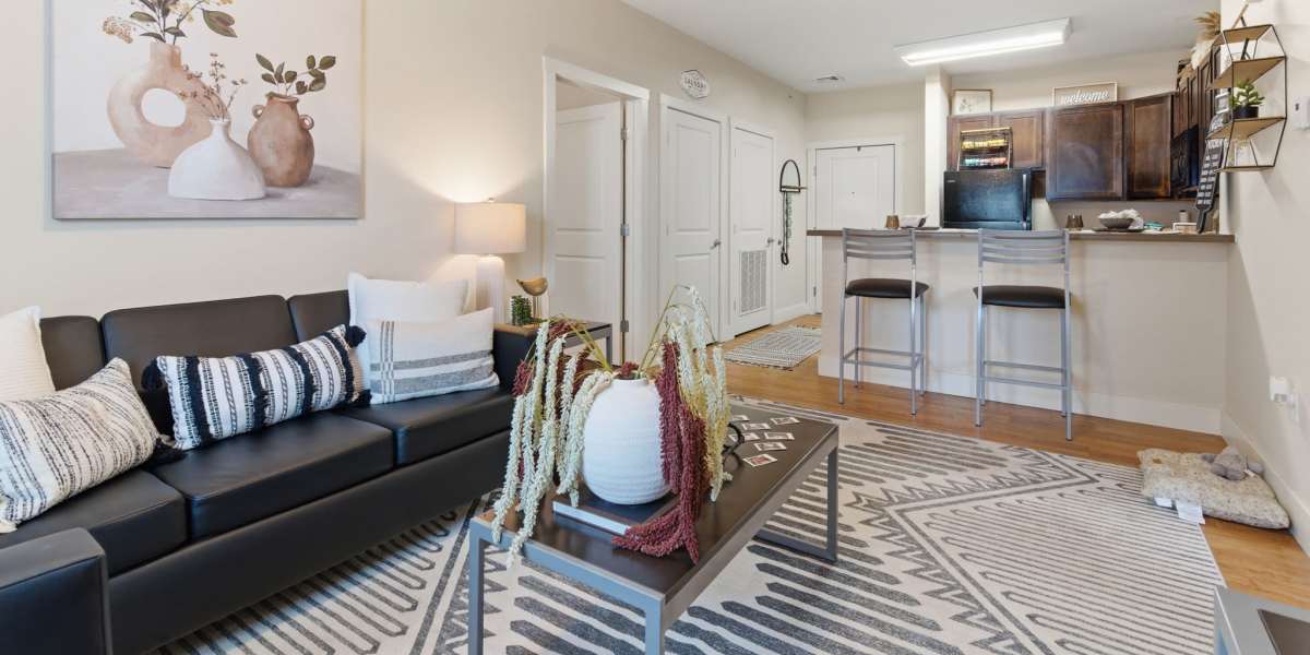 Modern living room with kitchen at Beacon Springfield in Springfield, Missouri