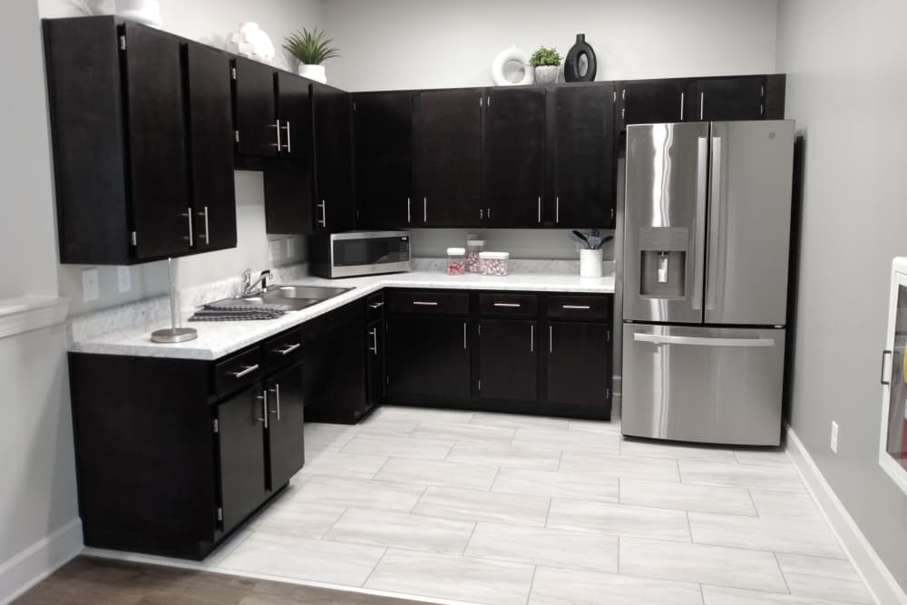 Modern kitchen with refrigerator at Peaks of Dahlonega in Dahlonega, Georgia