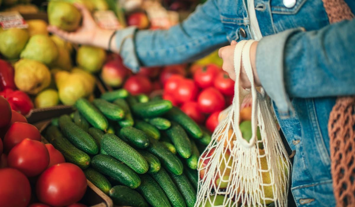 Resident shopping for fresh produce at a market near Rancho Los Feliz in Los Angeles, California