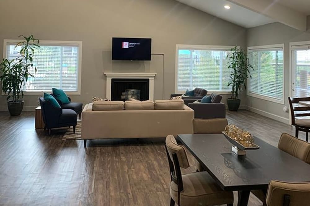 Clubhouse with seating and TV at Glenbrook Apartments in Chico, California