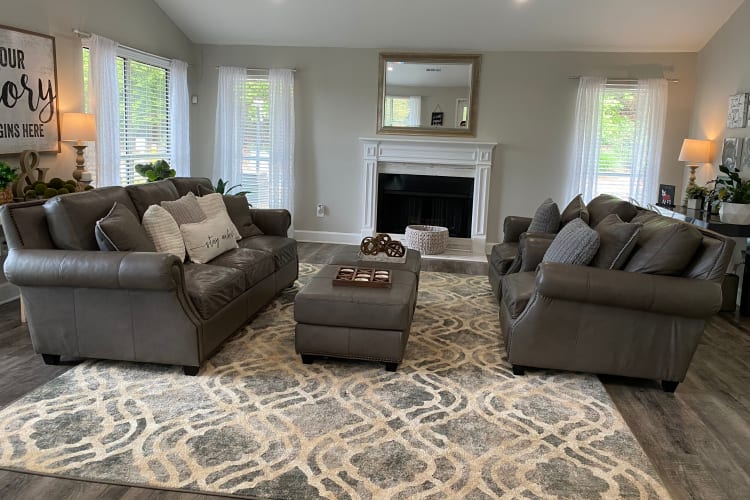 Well-decorated living room in a model home at 300 Riverside in Austell, Georgia