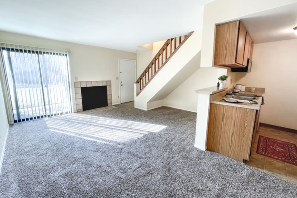Open-concept of kitchen and living room at Stonehaven Apartments in Hazelwood,Missouri