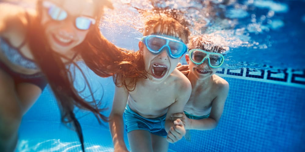 kids in a swimming pool at Pickwick Place in Oklahoma City, Oklahoma