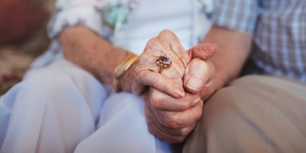 Resident couple holding hands at Edgerton Care Center in Edgerton, Wisconsin