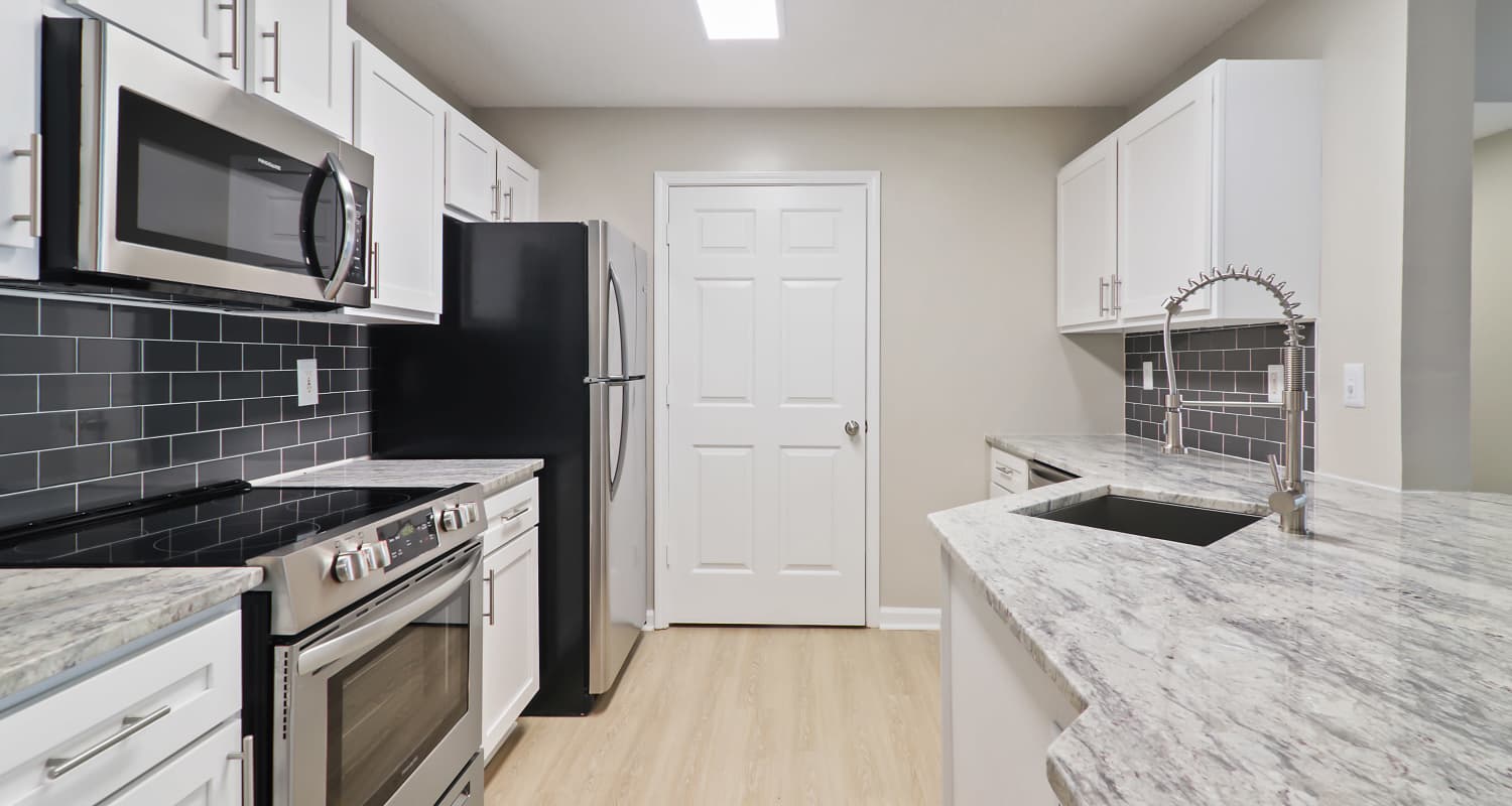 Apartment kitchen at The Waterford in Morrisville, North Carolina