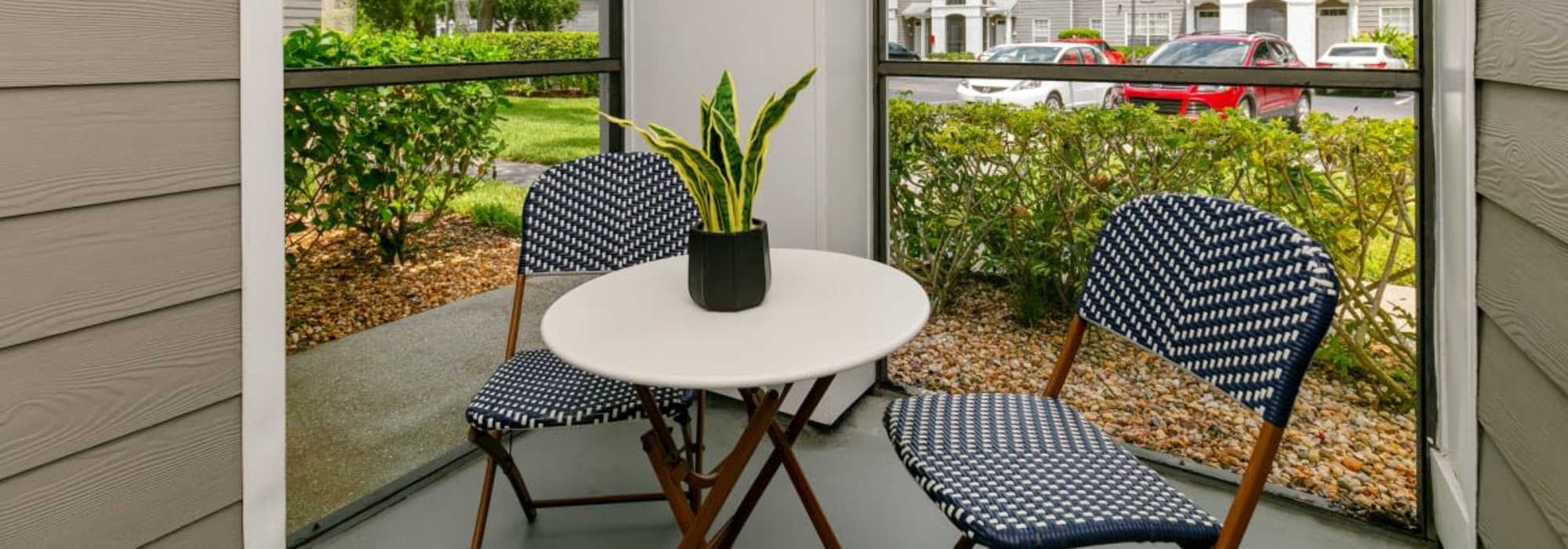 Beautiful patio seating at Woodmere Apartments of Venice in Venice, Florida