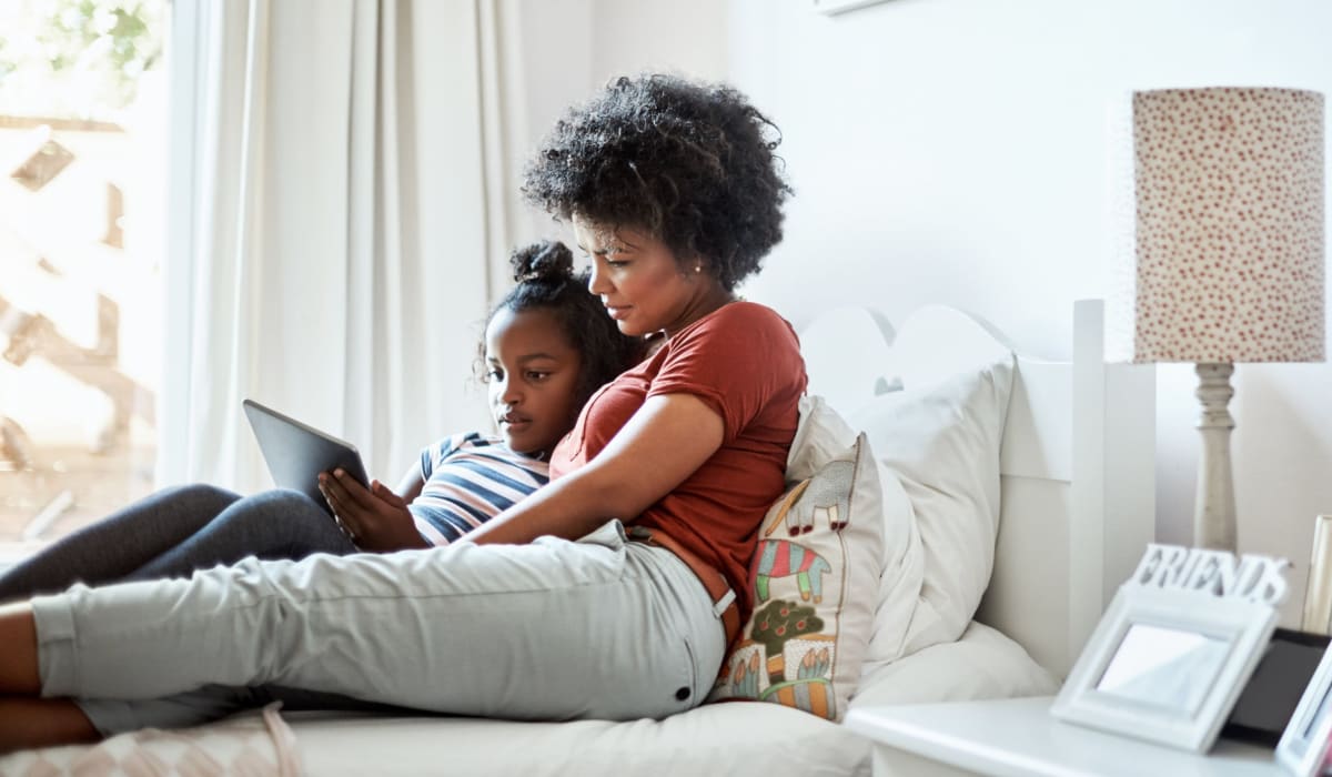 Mom and daughter reading at Southwood Vista in Atlanta, Georgia