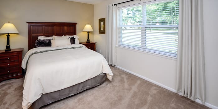 Enjoy a beautiful bedroom at Sherwood Village Apartment & Townhomes