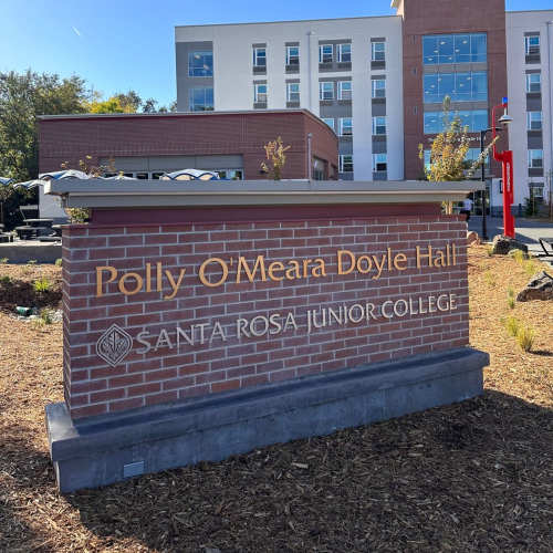 Apartment entrance sign board at Polly O'Meara Doyle Hall in Santa Rosa, California