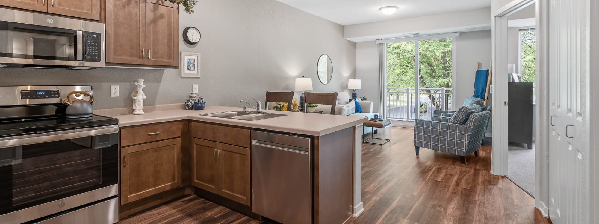 living room view at Floor Plans at The Sycamore of River Falls in River Falls, Wisconsin