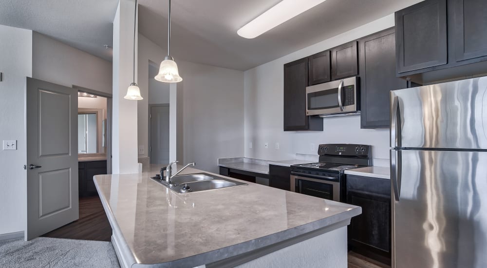 Kitchen with stainless-steel appliances at Bridgeway Chattanooga in Chattanooga, Tennessee