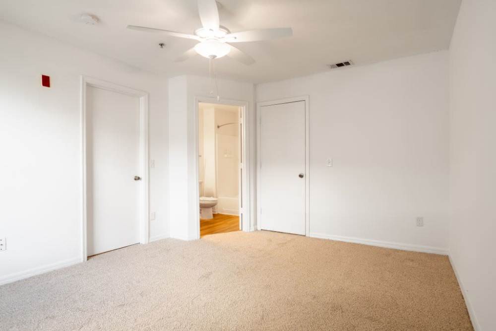 Master bedroom with access to bathroom at Stratford Point in Sanford, Florida