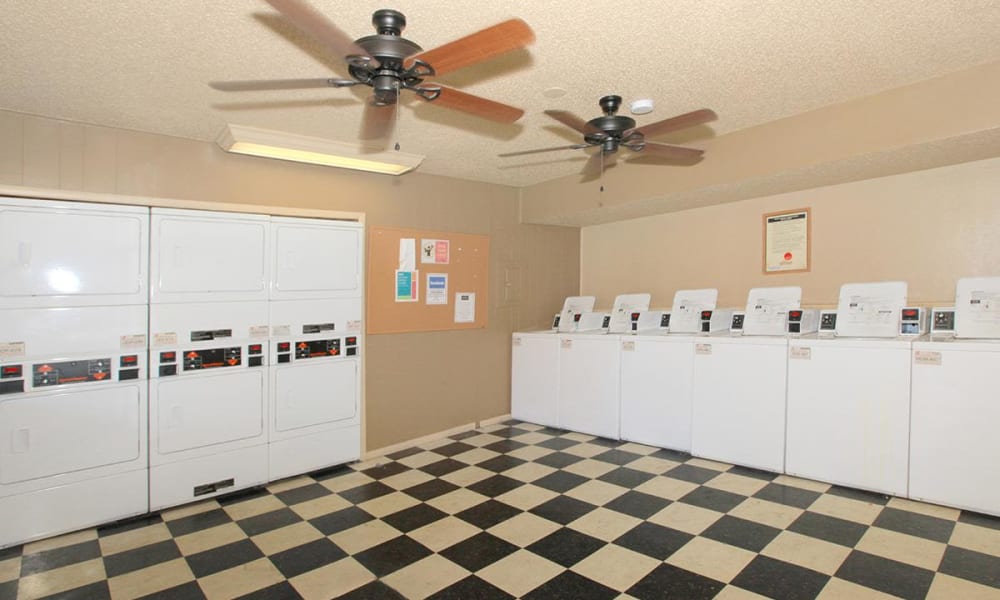 Washers and dryers in the laundry room at The Granite at Tuscany Hills in San Antonio, Texas