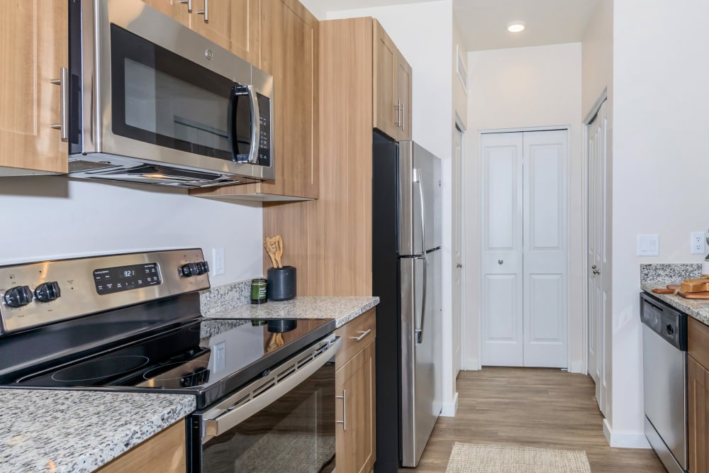 Kitchen with granite countertops at Trailside Apartments in Flagstaff, Arizona