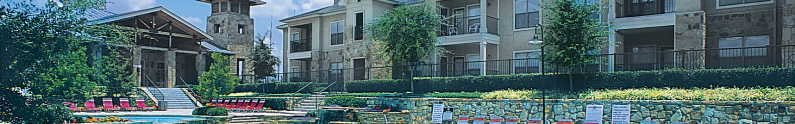 Parking at El Lago Apartments in McKinney, Texas