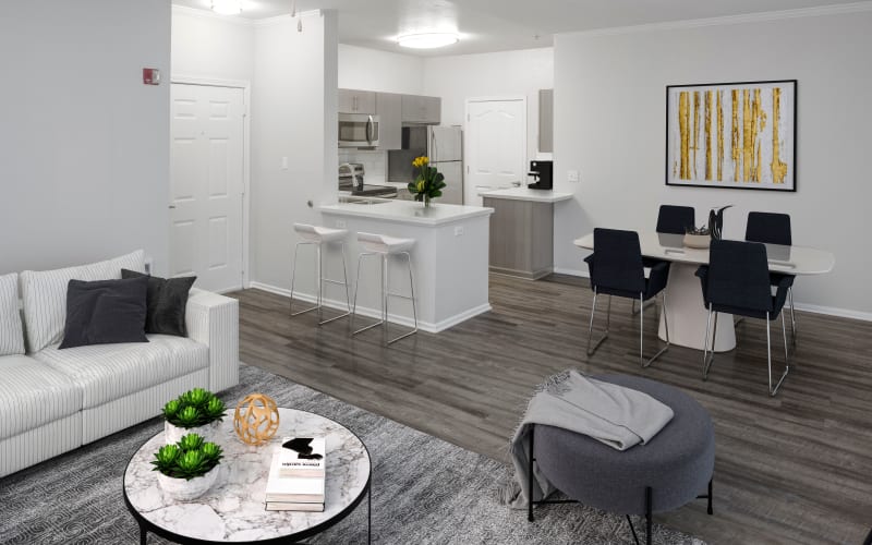 Spacious and bright living room, dining room and kitchen at The Grove at Orenco Station in Hillsboro, Oregon