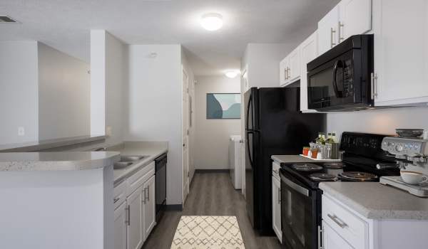 Kitchen with refrigerator at Valley View Estates in Council Bluffs, Iowa