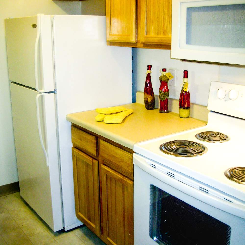 Apartment kitchen at Maple Heights Apartments in Saline, Michigan