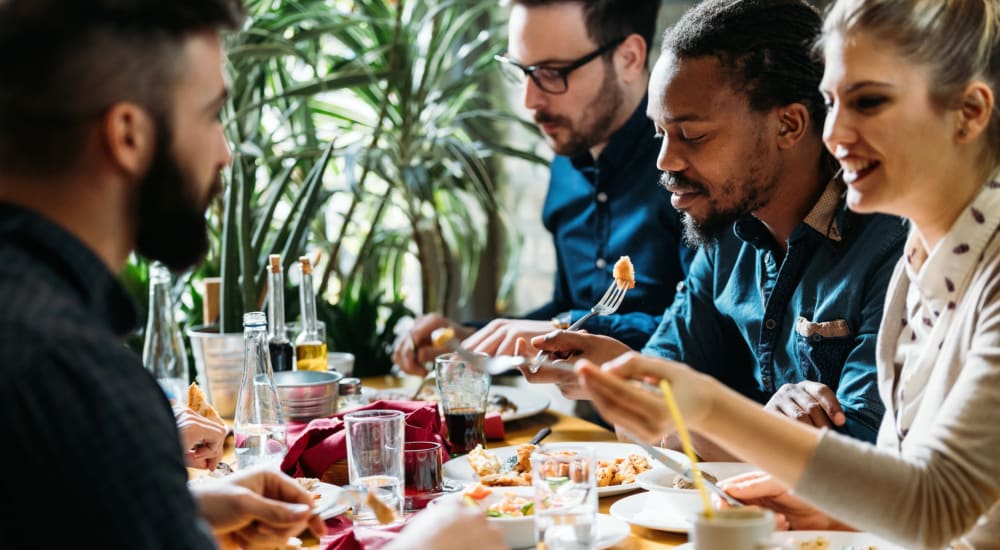 Residents enjoy a meal at their favorite restaurant near 5700 Madison in Indianapolis, Indiana