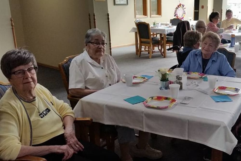 Residents enjoy a party in the dining room at Prairie Meadows Senior Living in Kasson, Minnesota.