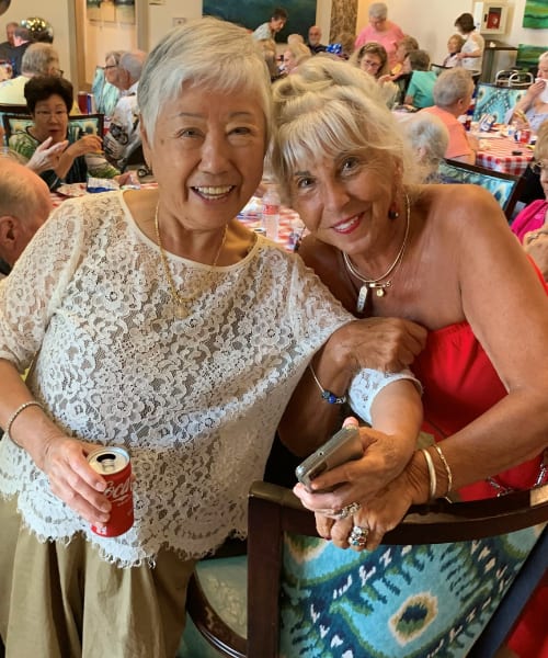 Residents enjoying happy hour at Atlas Point at Prestonwood in Carrollton, Texas