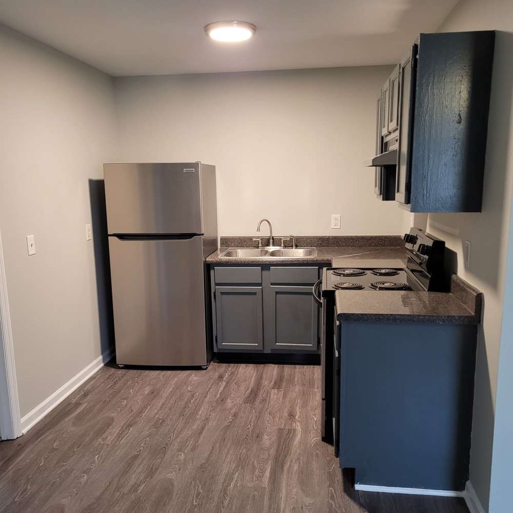 Kitchen with stainless-steel appliances at Maple Manor Apartments in Lebanon, Tennessee