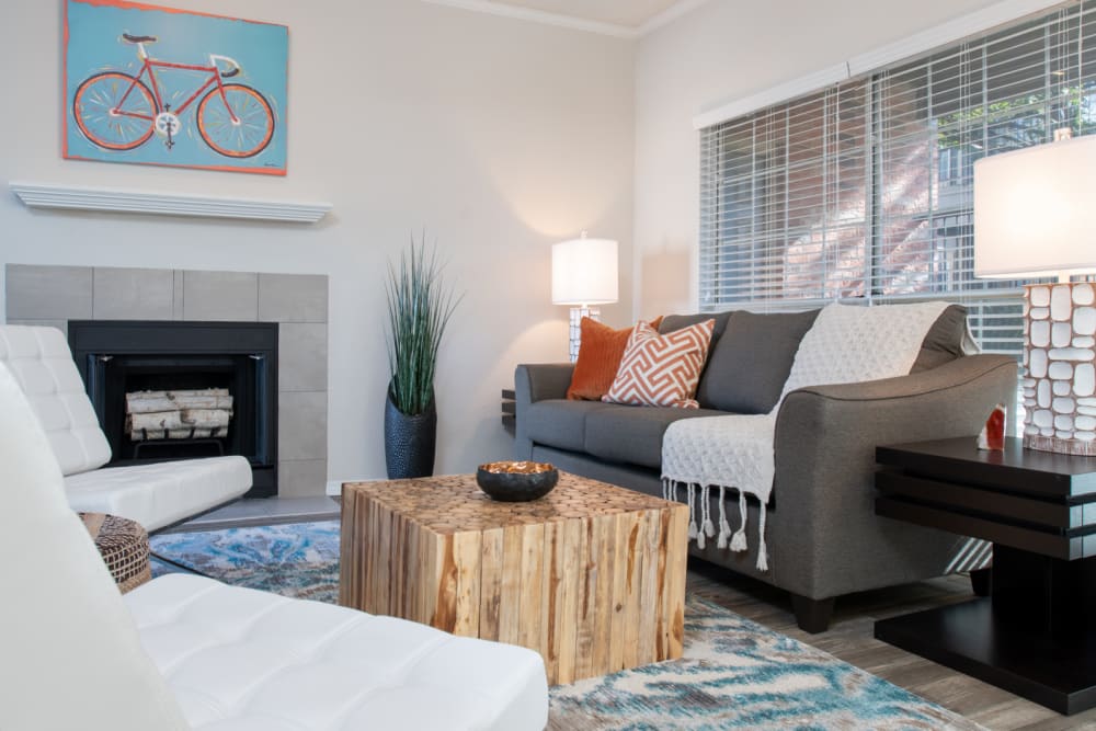 Living area with fireplace at Copper Chase in Arlington, Texas