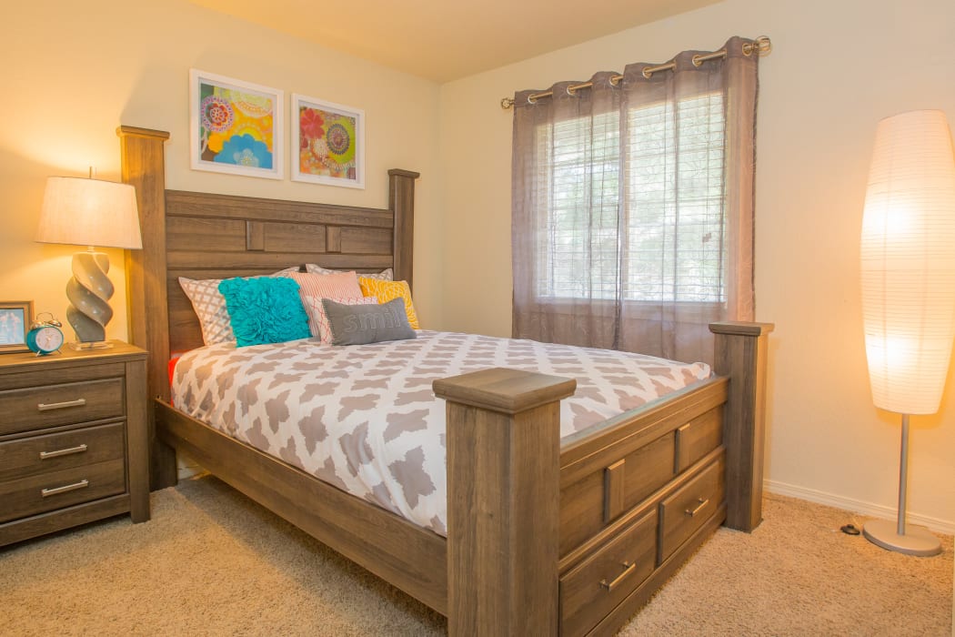 An apartment bedroom at Chardonnay in Tulsa, Oklahoma