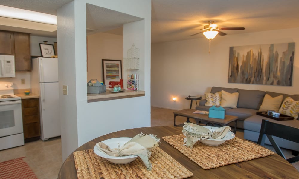 Bright and open living room and dining table at Hunter's Ridge in Oklahoma City, Oklahoma